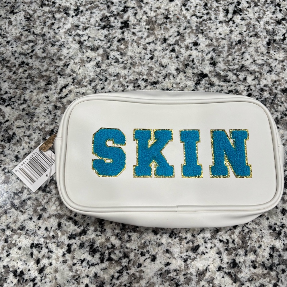 White Pouch with Blue and Gold 'SKIN' Design - Picture 7 of 9